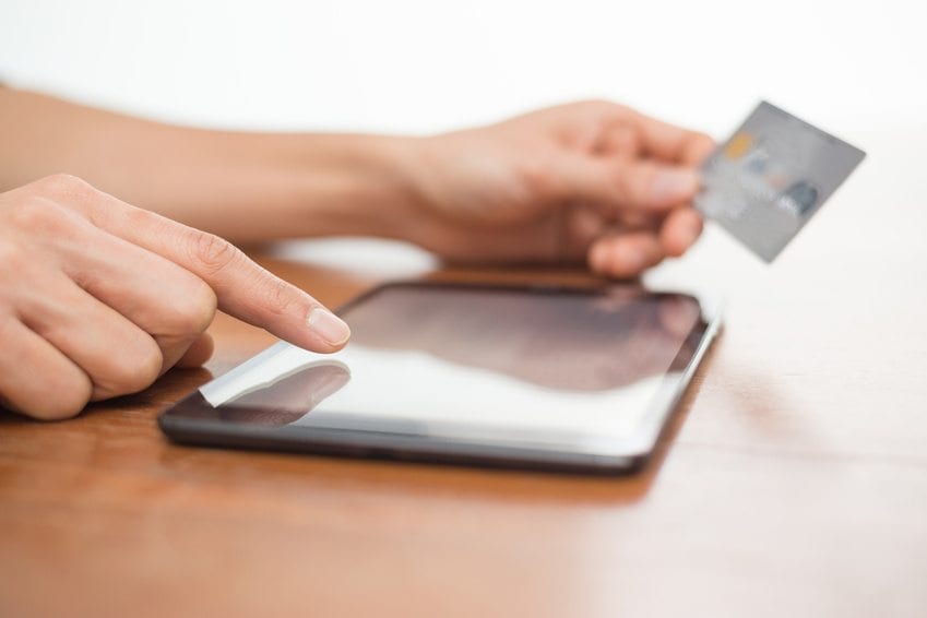 Online-shopping-using-digital-tablet-and-credit-card